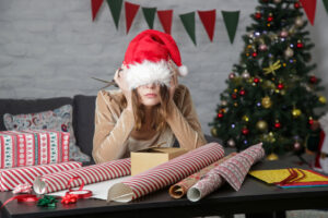How can employers help reduce stress over the holidays?