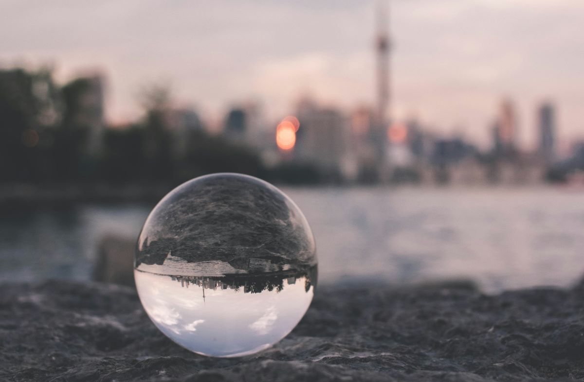 Focus and intentionality: A glass sphere clarifies but upends a city skyline.